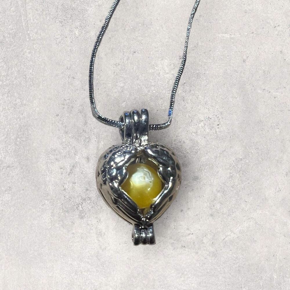 Silver Heart Shaped Cage Earrings and Pendant Necklace Set with Yellow Pearls - Picture 5 of 5